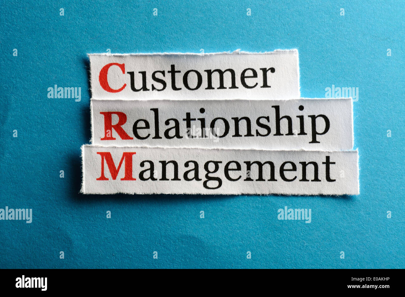 CRM customer relation management abbreviazione su carta blu Foto Stock