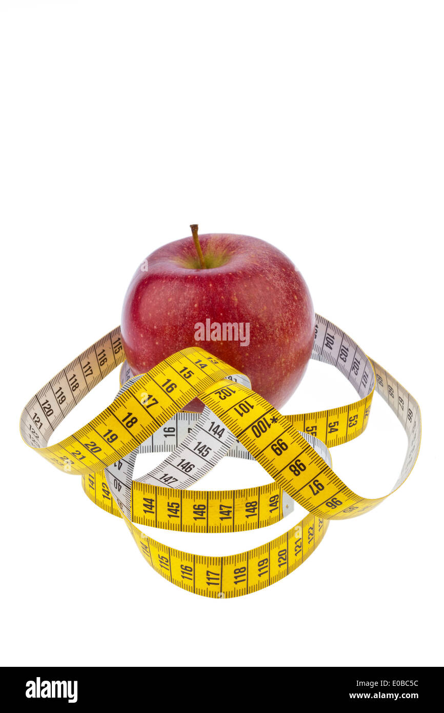 Un Apple e una dimensione del nastro per la dieta di successo. Su sfondo bianco, Ein Apfel und ein Massband fuer erfolgreiche Diaet. Auf Foto Stock