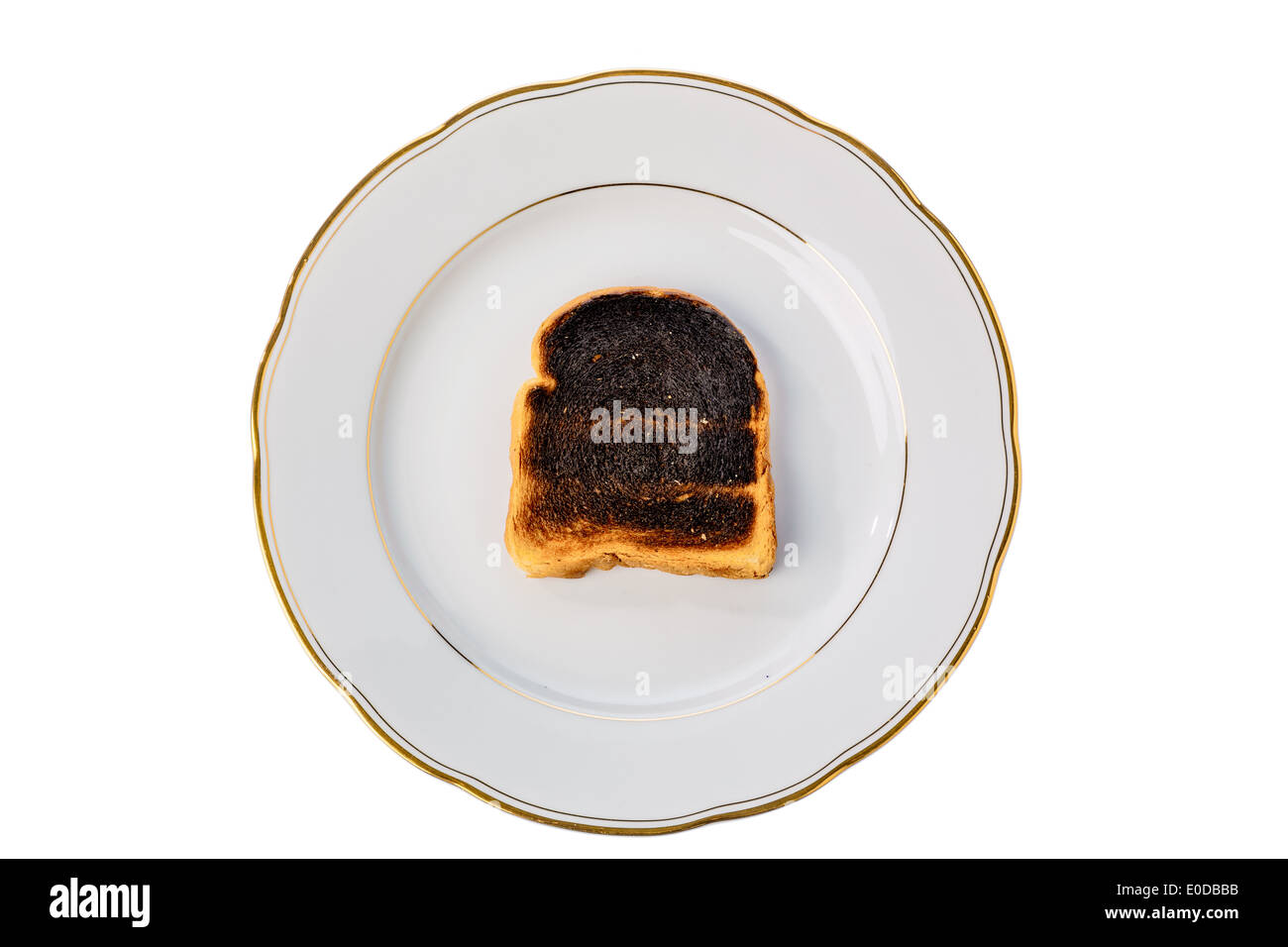 Tostare il pane divenne burntly. Burntly toast con i dischi e la prima colazione., Toastbrot wurde beim toasten verbrannt. Foto Stock