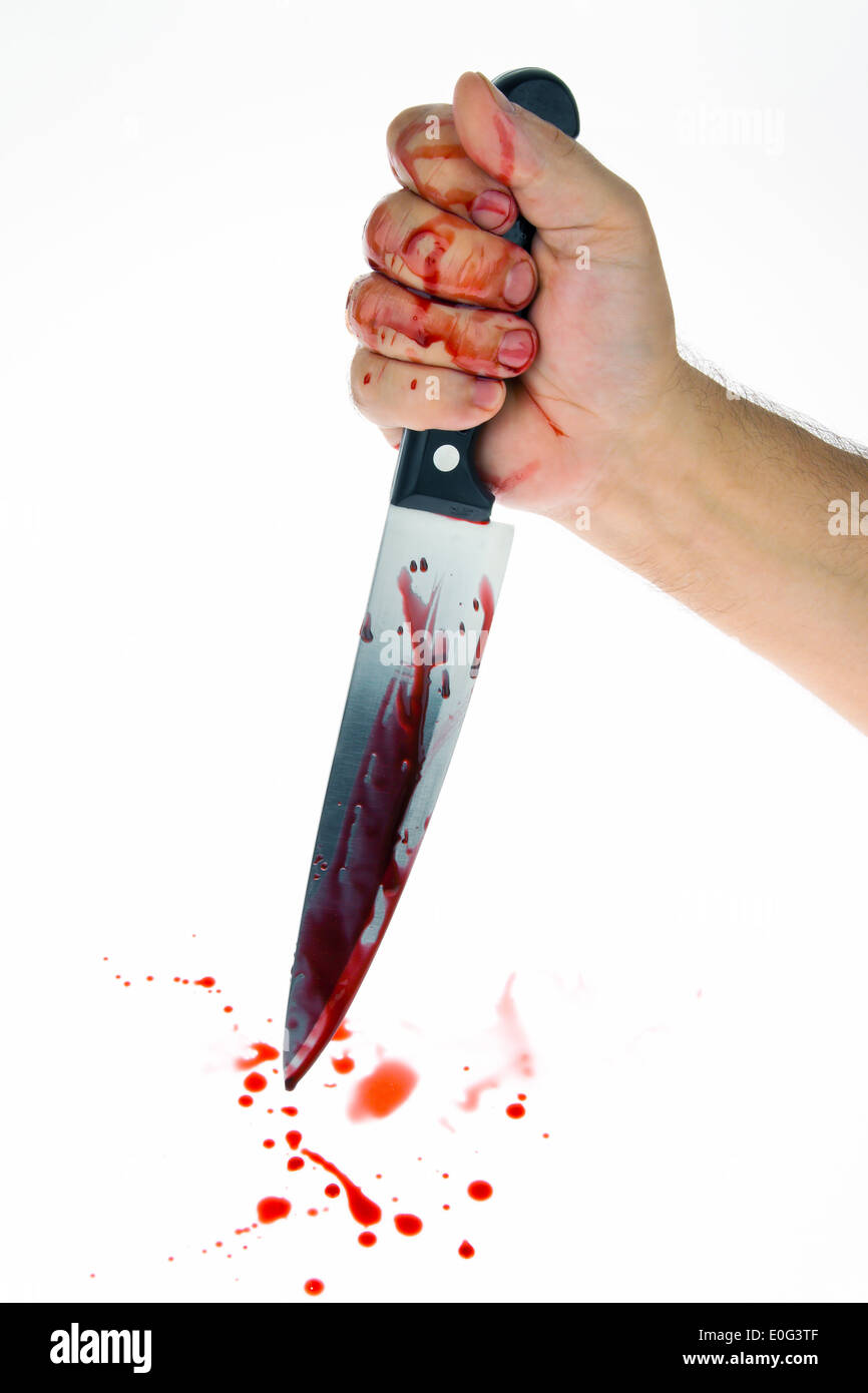 Un coltello con strisci di sangue. Azione arma di un omicidio. Foto simbolico di attività criminale, Ein Messer mit Blut verschmiert. Tatwaff Foto Stock