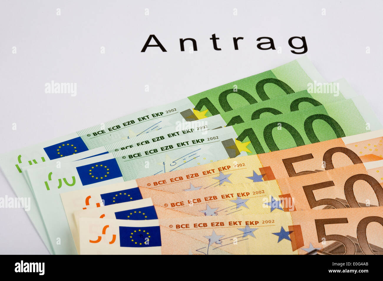 Applicazione e banconote, Antrag und Geldscheine Foto Stock