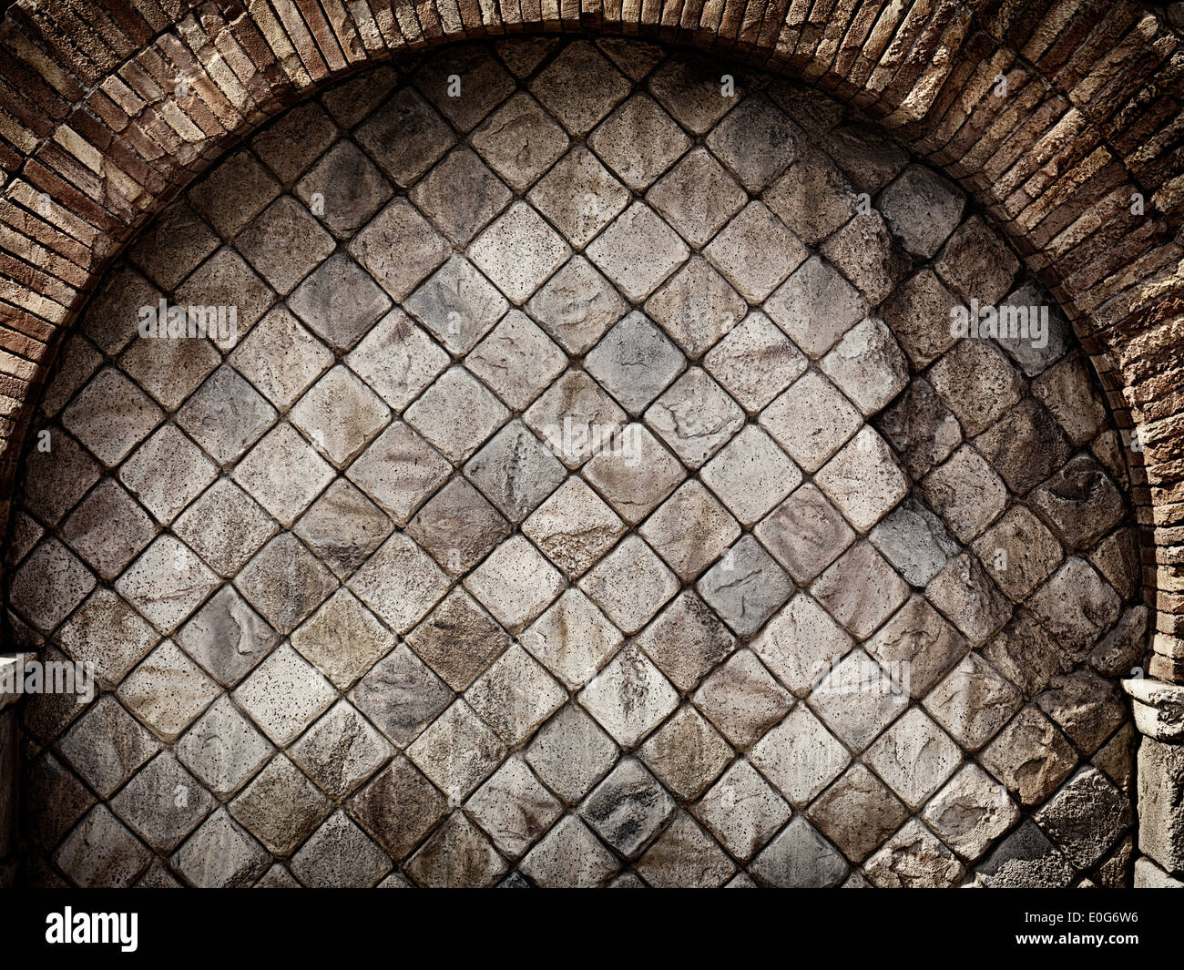 Vecchio rustico in pietra a parete con arco in mattoni grungy texture di sfondo Foto Stock