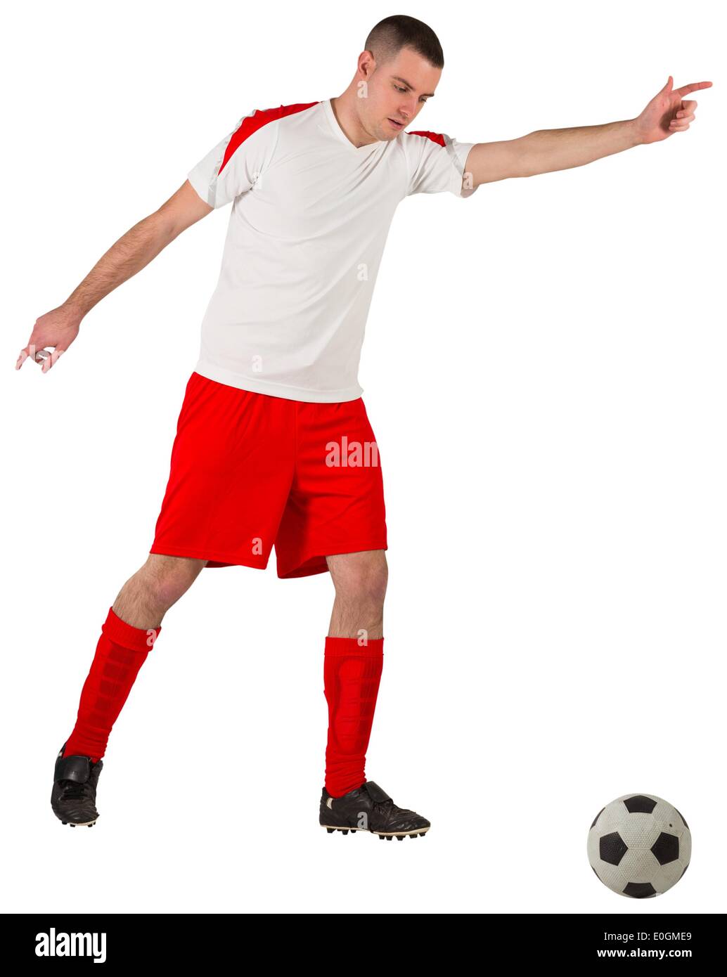 Montare il calcio giocatore giocare con sfera Foto Stock