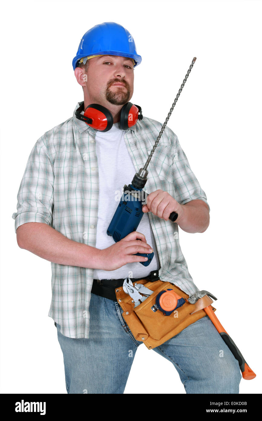 Un tuttofare con un trapano. Foto Stock
