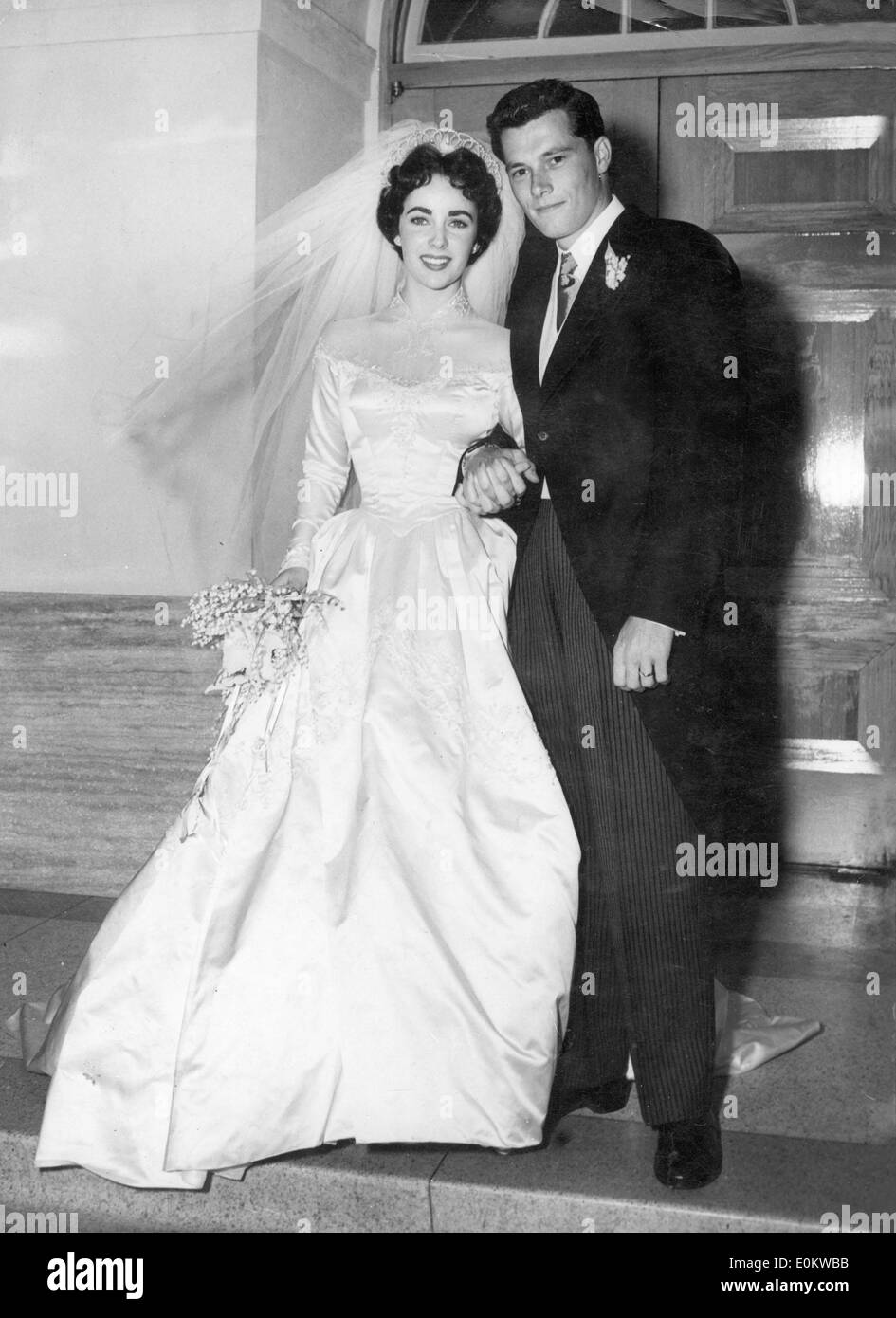 Elizabeth Taylor e Conrad Hilton al loro ricevimento di nozze Foto Stock