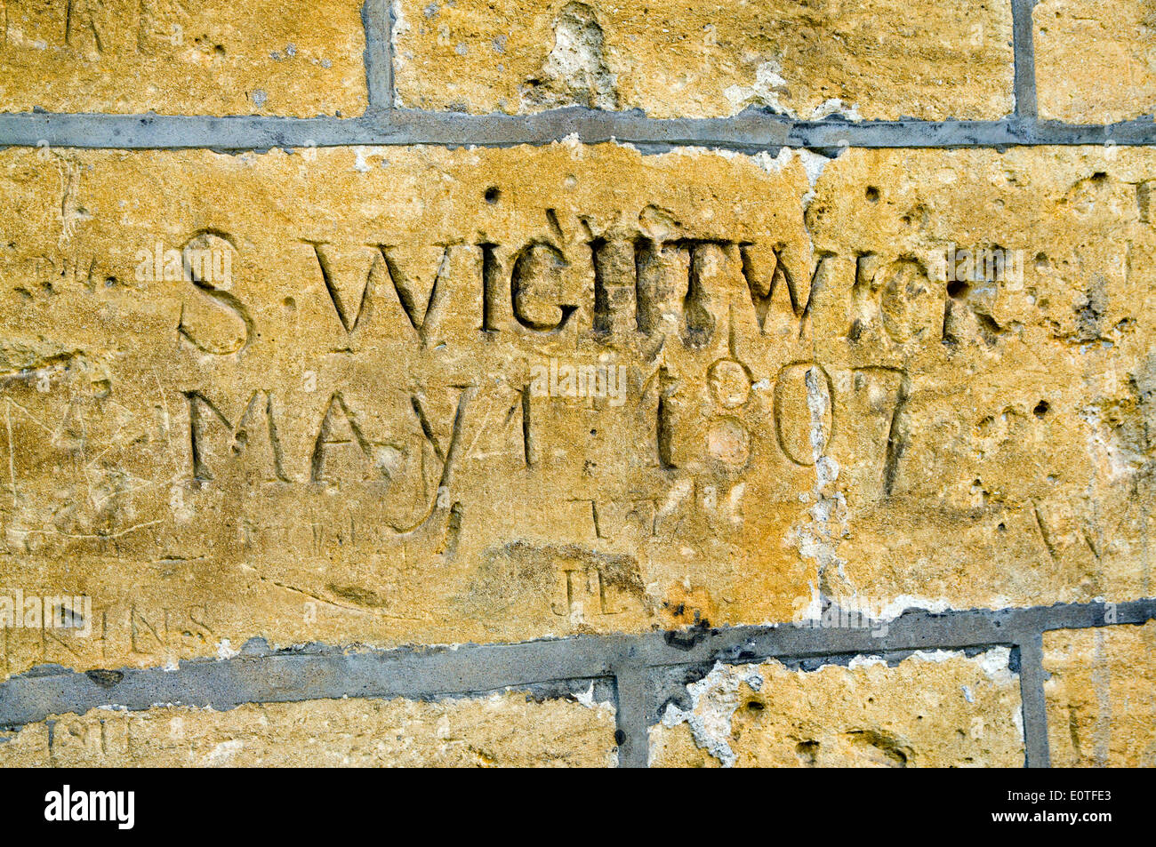 Georgian graffiti, intagliato nella cattedrale di Gloucester, Inghilterra. Foto Stock