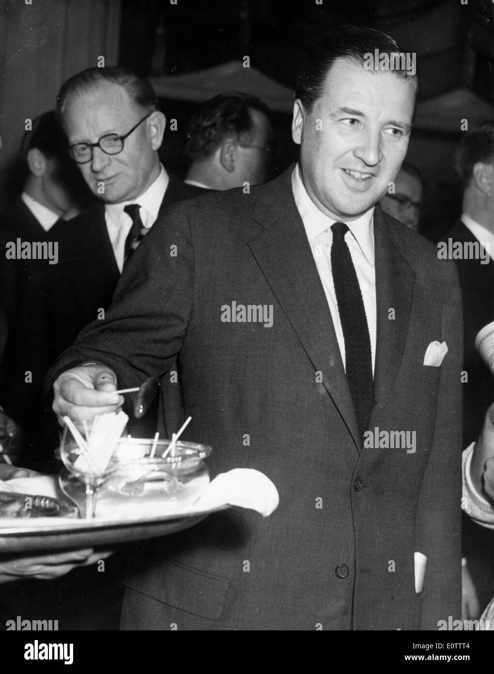 Henry Ford II per partecipare ad un cocktail party Foto Stock
