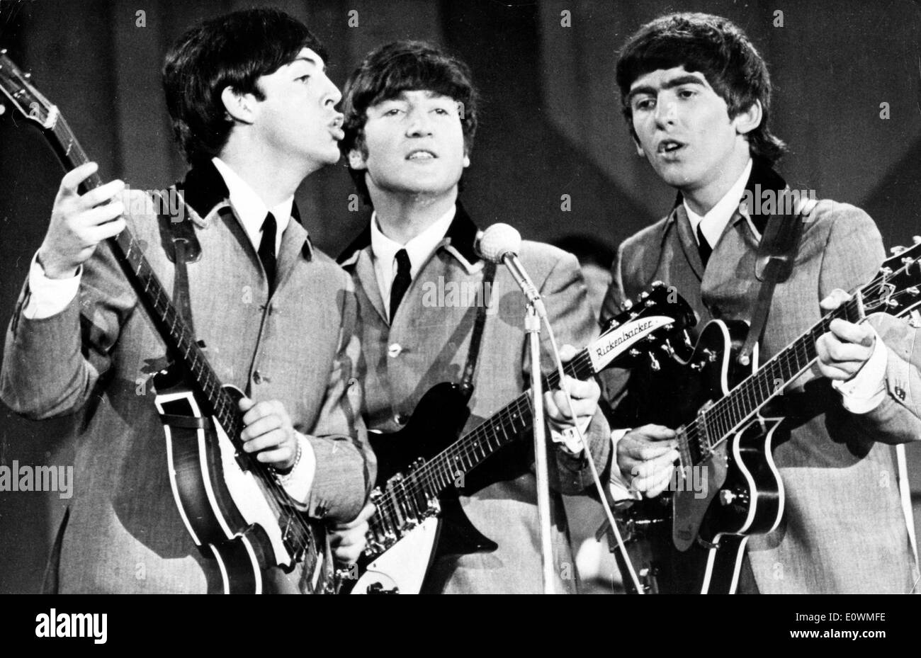 I Beatles McCartney, Lennon e Harrison durante una performance Foto Stock