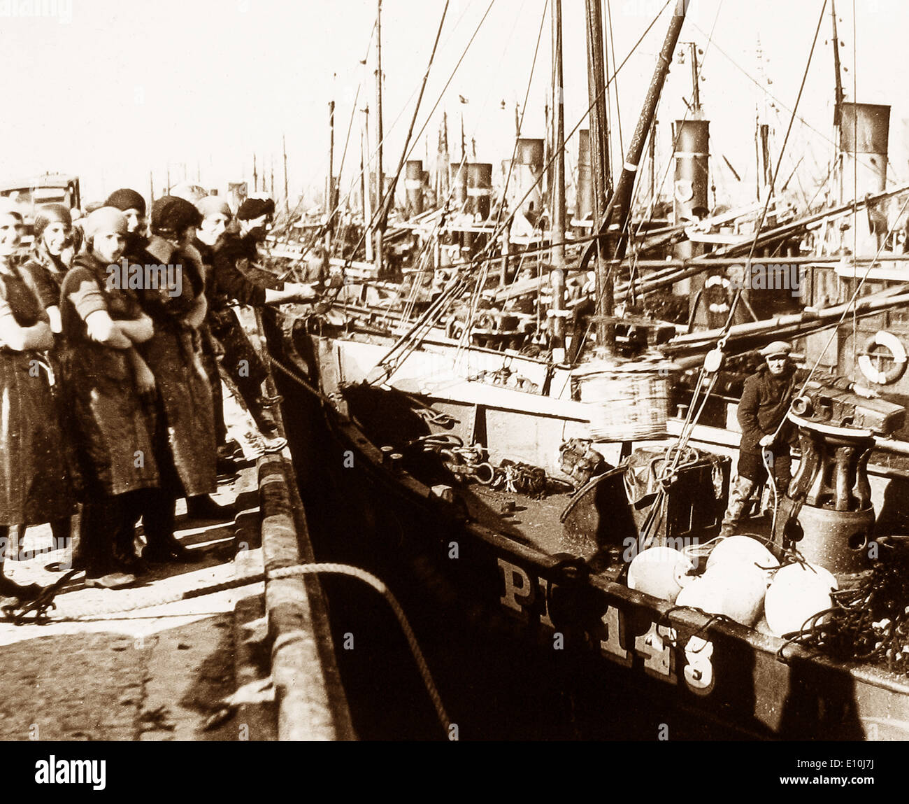 Great Yarmouth aringhe della flotta e le ragazze di pesce primi 1900s Foto Stock