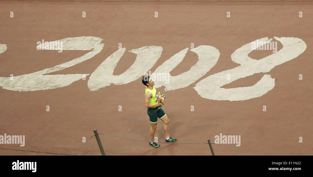 Pechino, Cina. 21 Maggio, 2014. Xie Wenjun della Cina festeggia dopo aver vinto gli uomini 110m Hurdles presso la IAAF World Challenge di Beijing in Cina, 21 maggio 2014. Credito: Liao Yujie/Xinhua/Alamy Live News Foto Stock