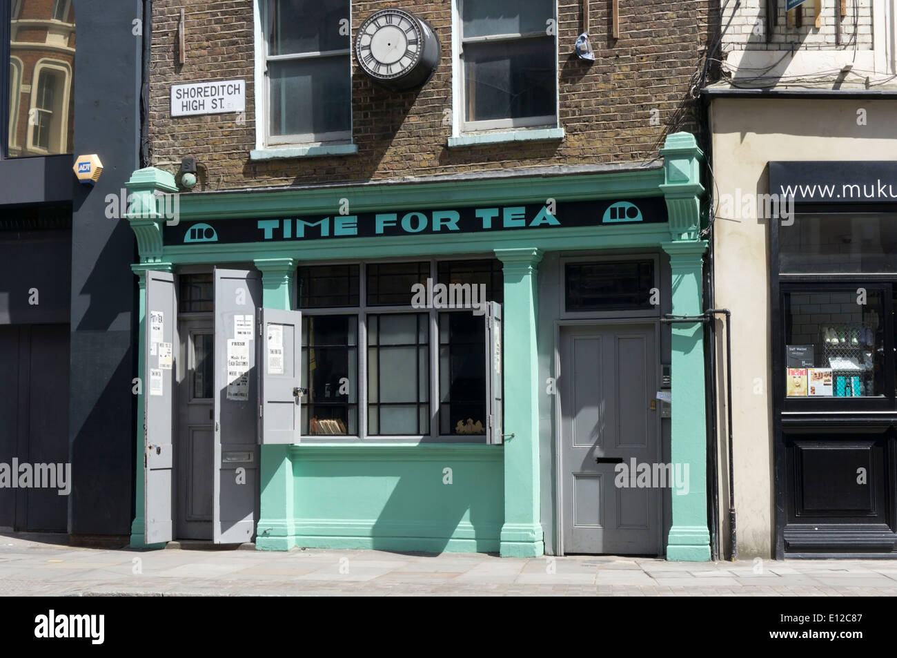 Tempo per il tè in Shoreditch High Street, East London. Foto Stock