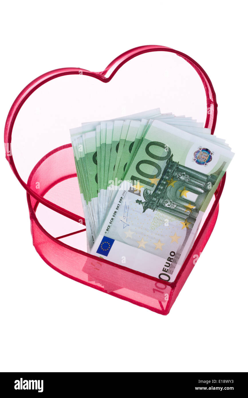 Viele Euro Geldscheine mit Herz. Vor weiflem Hintergrund Foto Stock