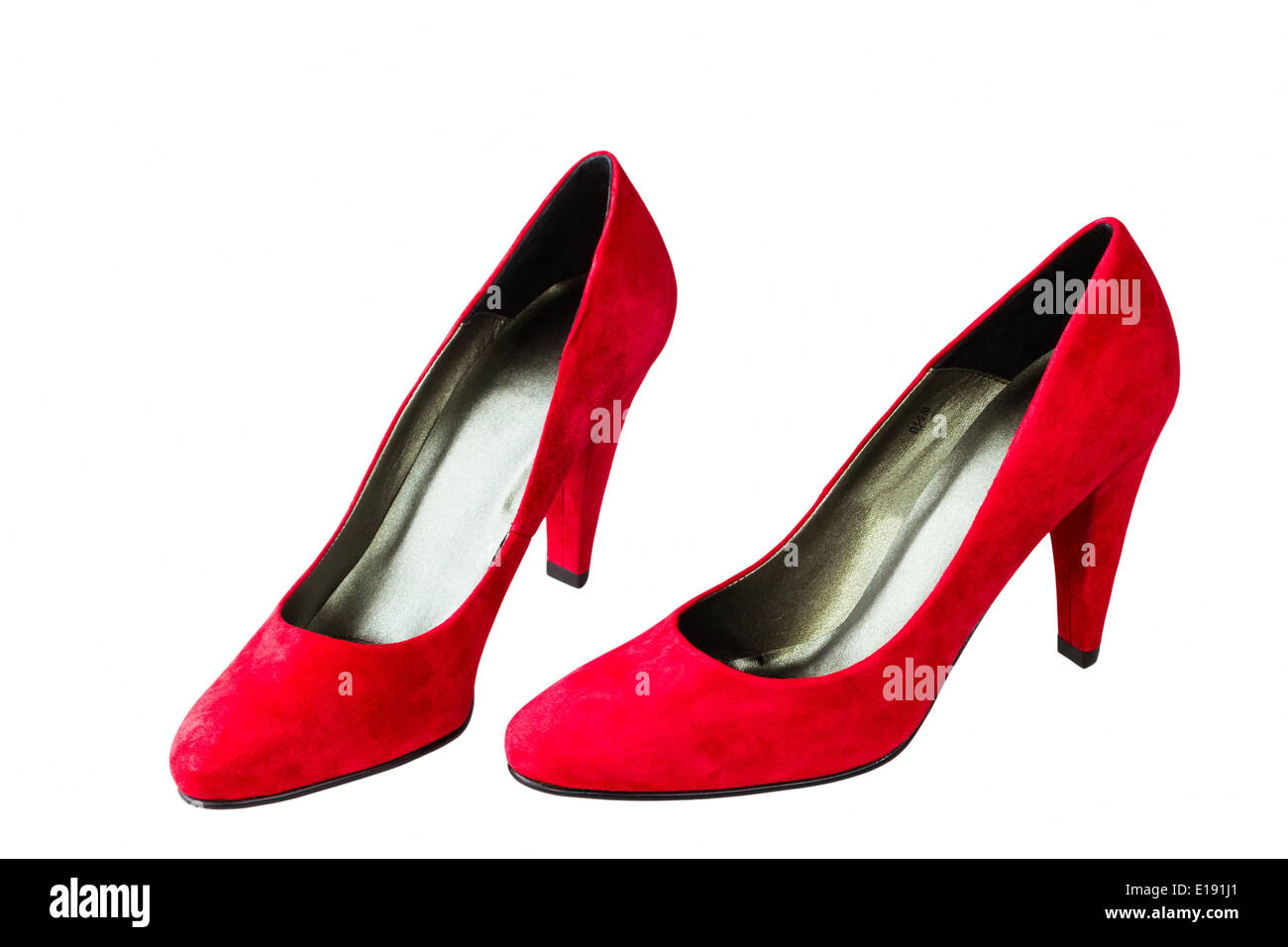 Donna di velluto rosso scarpe isolati su sfondo bianco Foto Stock