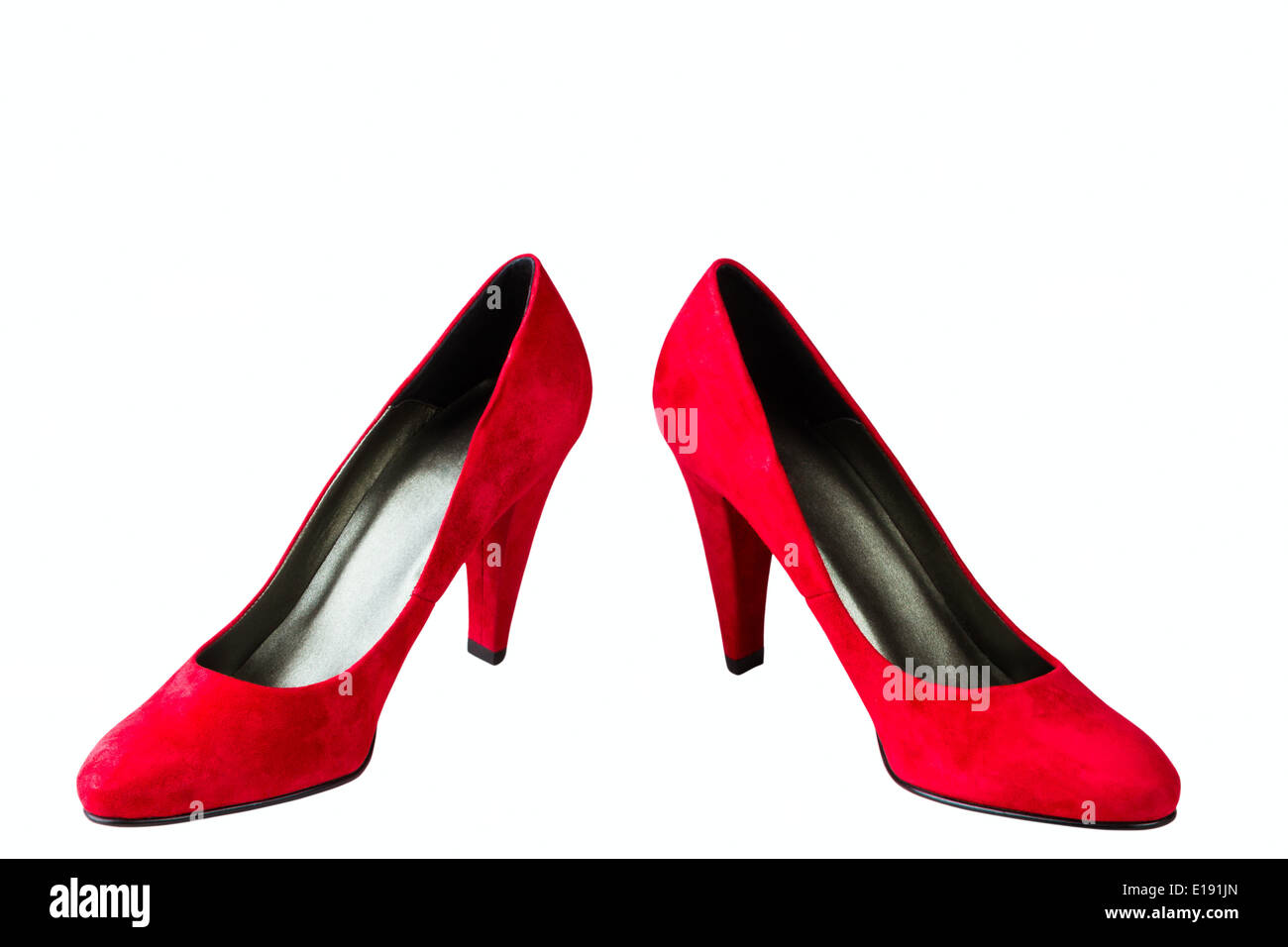 Donna di velluto rosso scarpe isolati su sfondo bianco Foto Stock