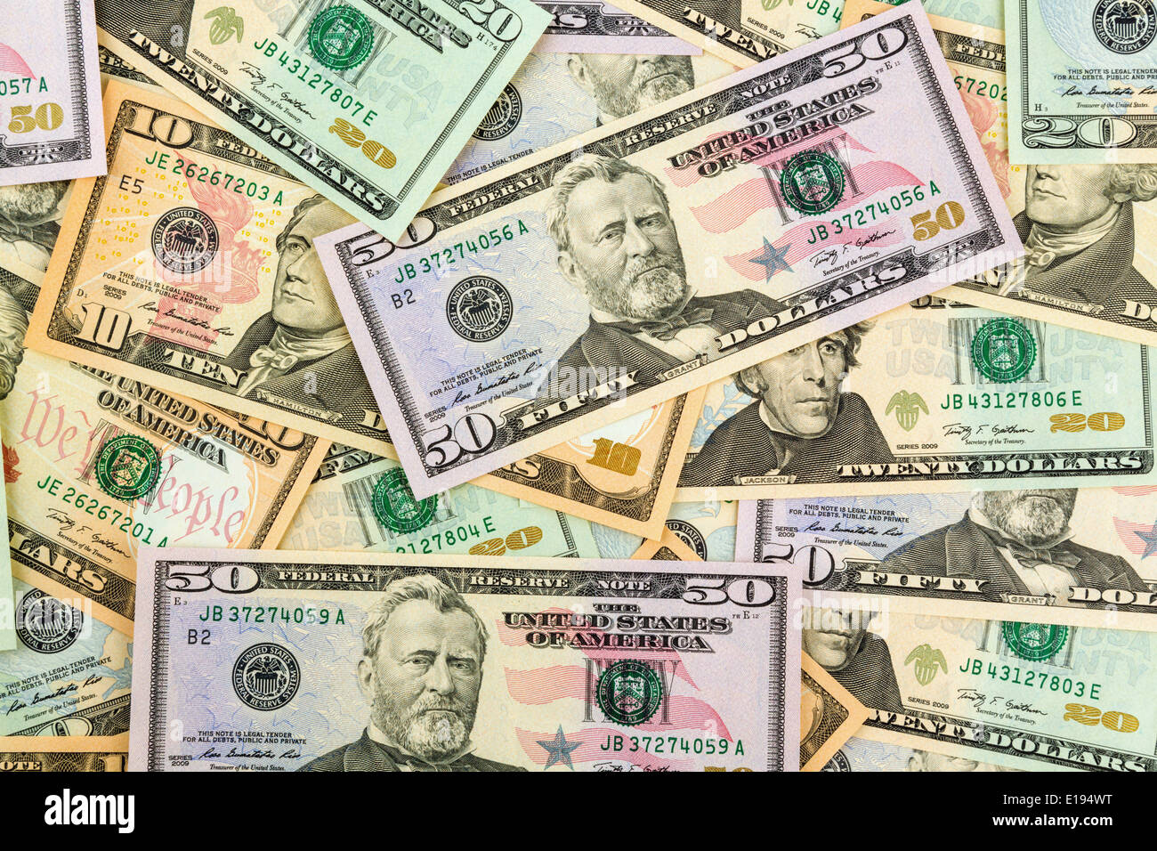 Viele amerikanische Dollar Geldscheine. Symbolfoto fÃ¼r Schulden und Reichtum Foto Stock