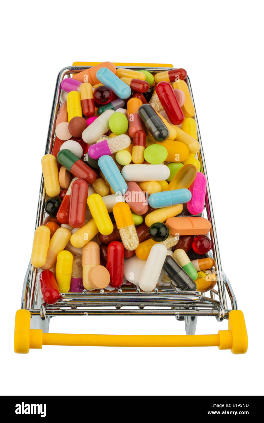 Tabletten mit Einkaufswagen. Symbolfoto f'r den Einkauf von Medikamenten im Internet Foto Stock