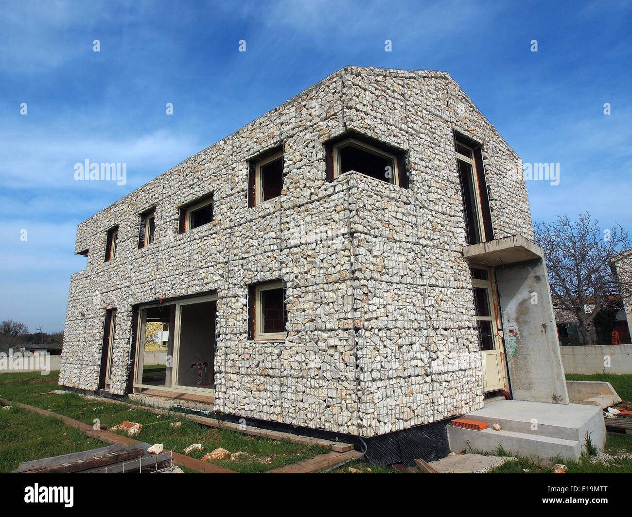 La costruzione di nuova ecologia casa di pietra Foto Stock