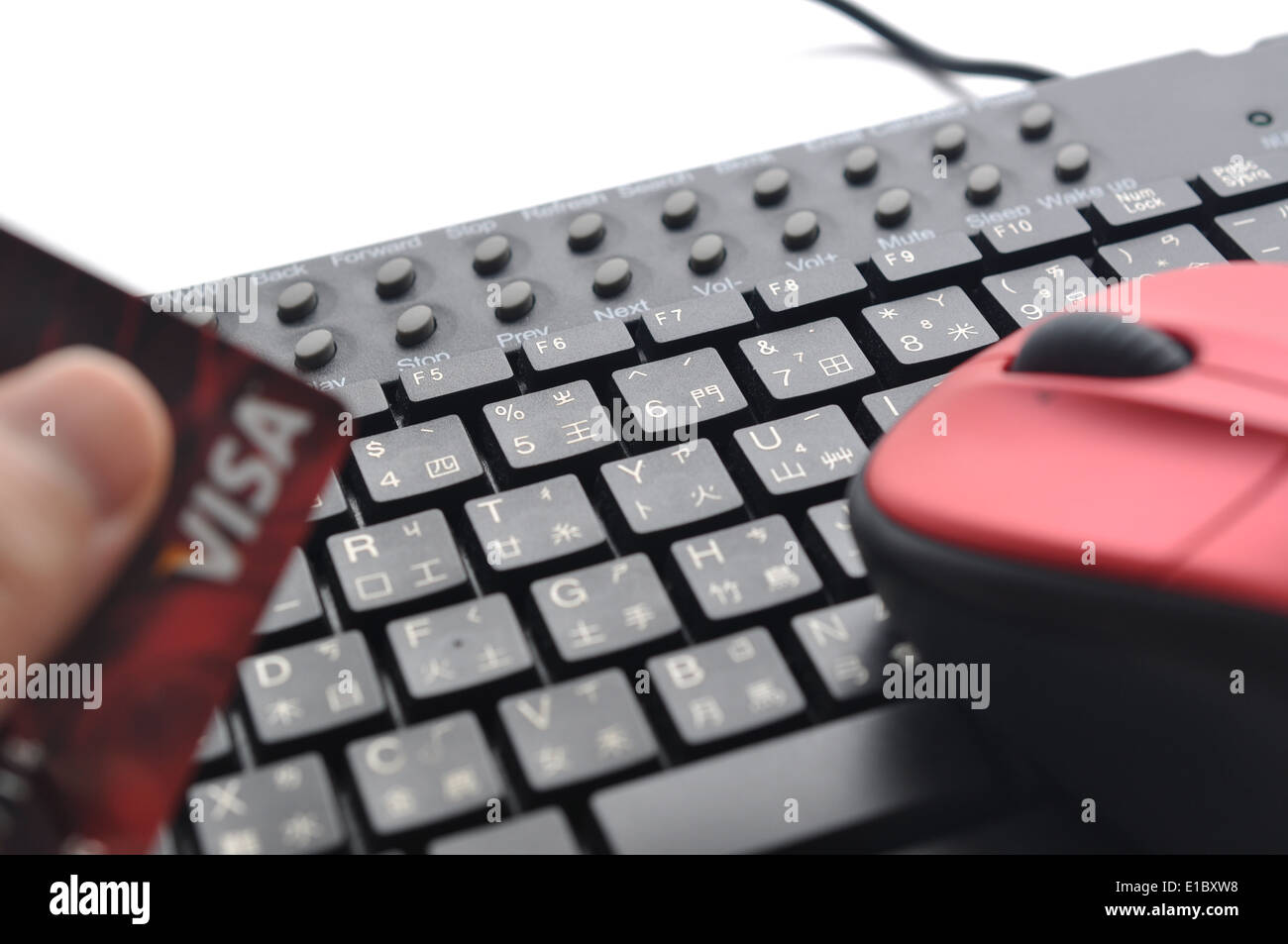 Digitare le informazioni della carta di credito sulla tastiera cinese ; concentrarsi sulla tastiera Foto Stock