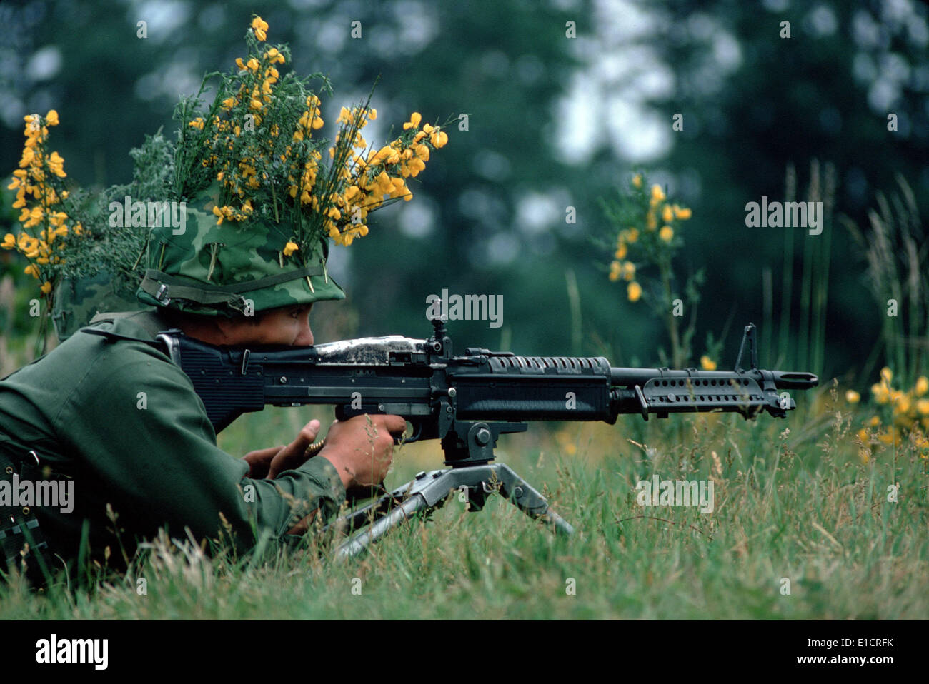 Guerra del Vietnam. Un mimetizzata fante armato con un M60 mitragliatrice. 1972 Foto Stock
