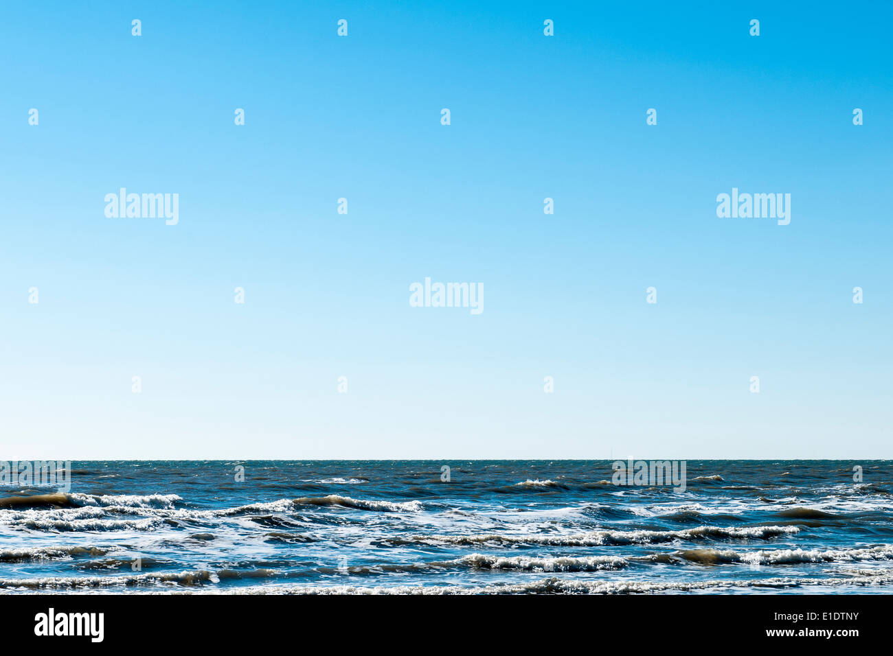 Surf e Sky in Galveston, Tx Foto Stock