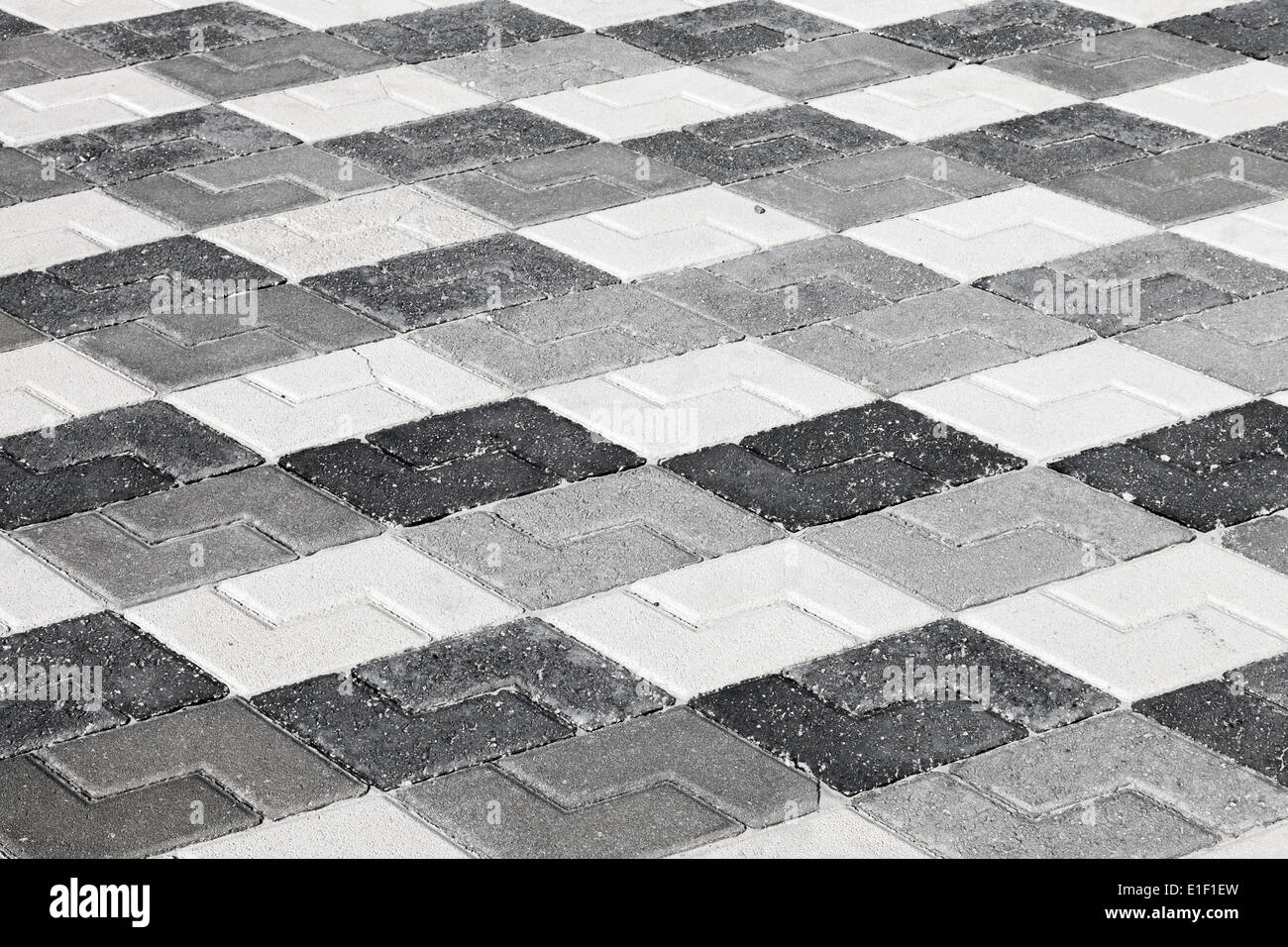 Nero Grigio e bianco disegno urbano della pavimentazione stradale Foto Stock