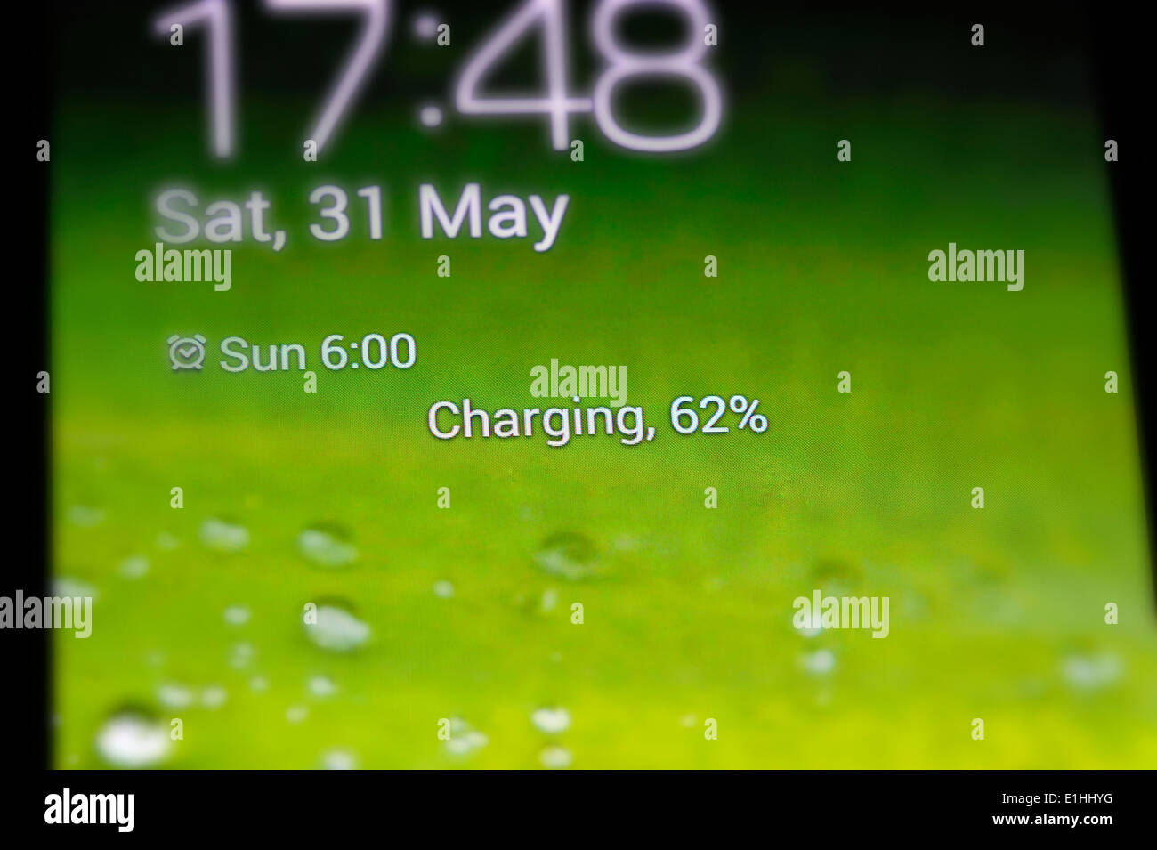 Telefono mobile la ricarica 62% Foto Stock