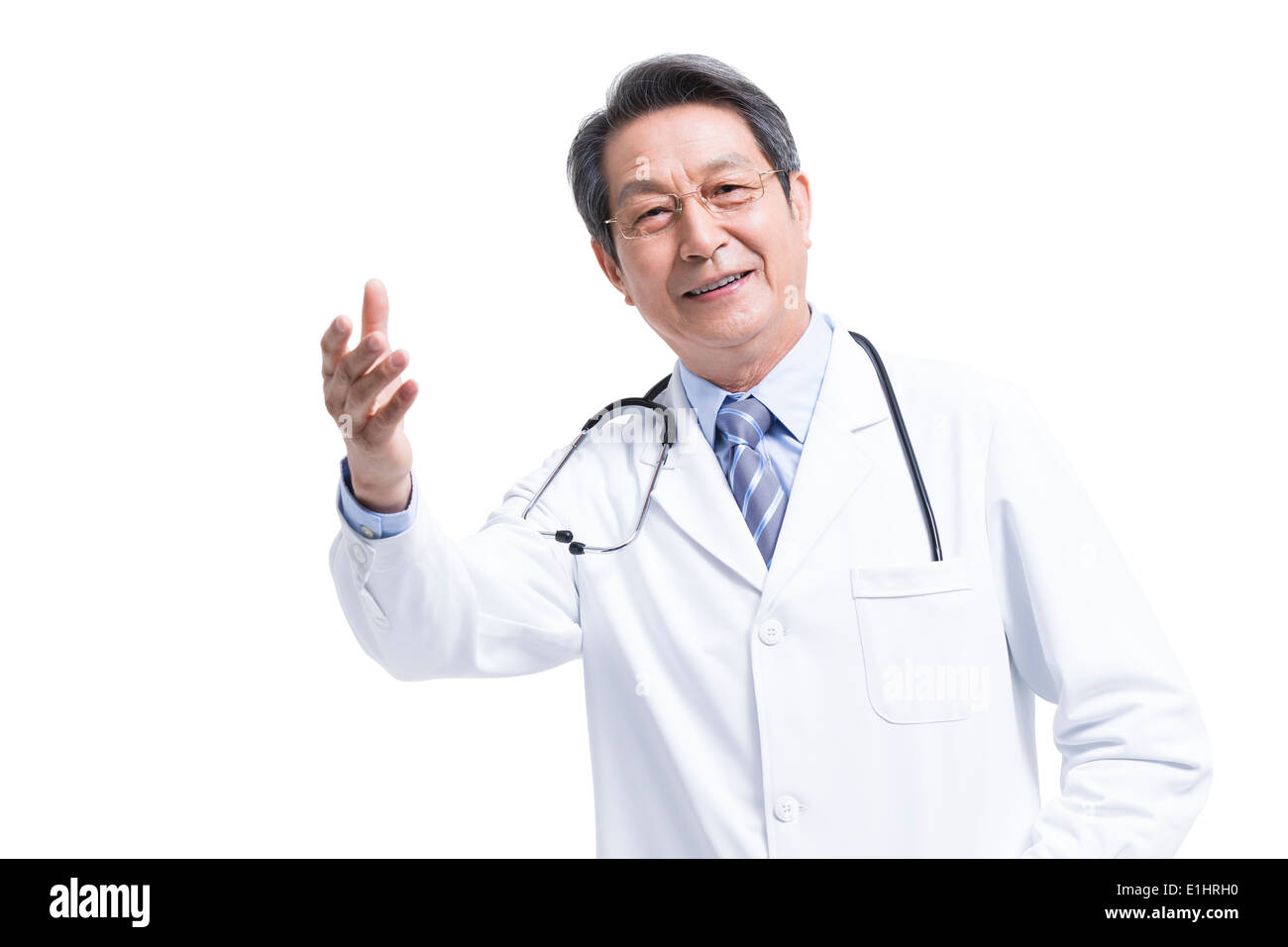 Felice medico maschio parlando Foto Stock