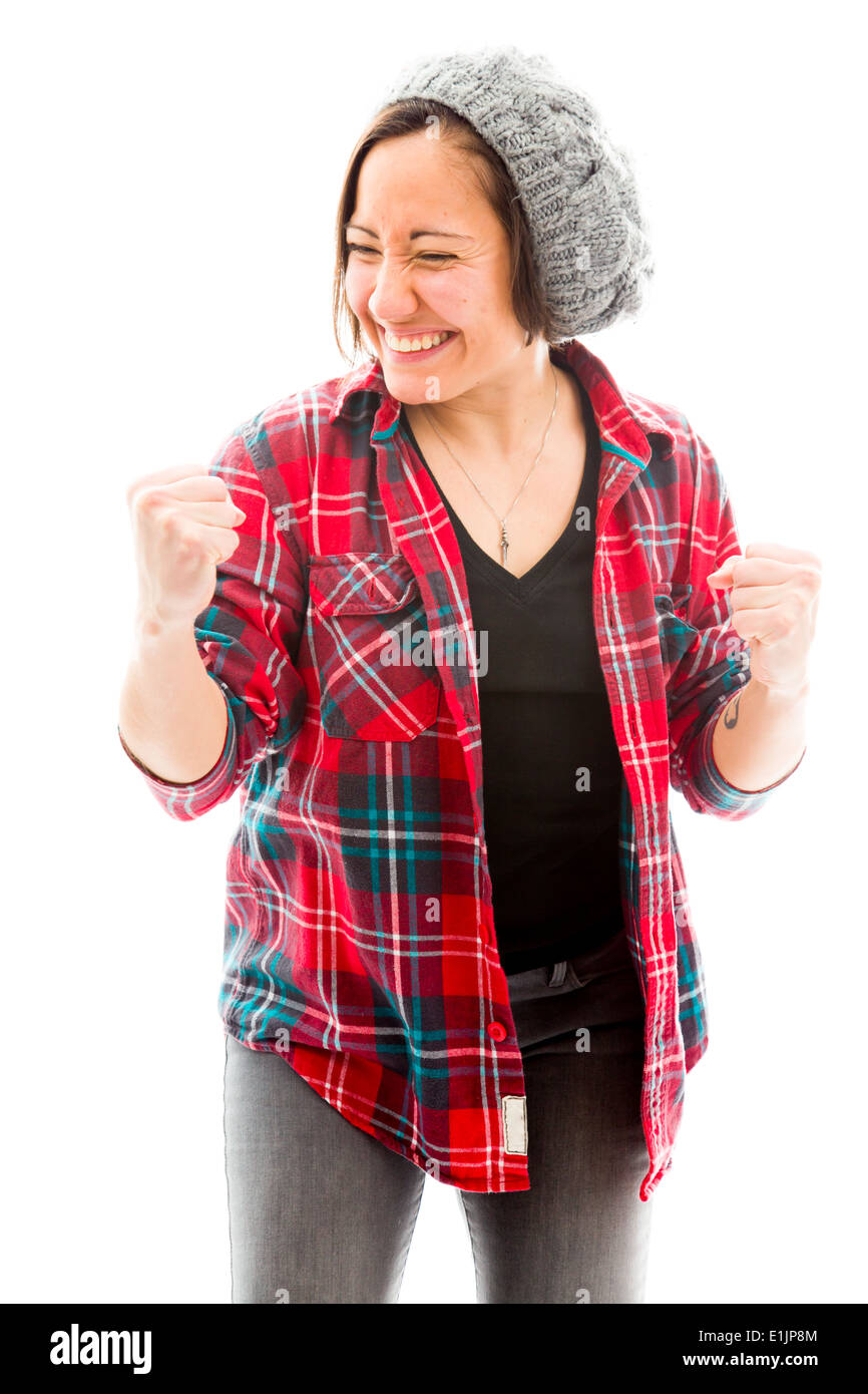 Giovane donna punzonatura l'aria e sorridente Foto Stock