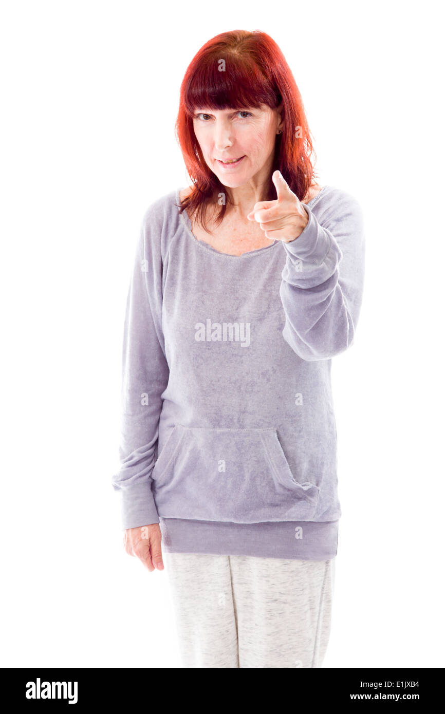 Donna matura rivolta verso la telecamera Foto Stock