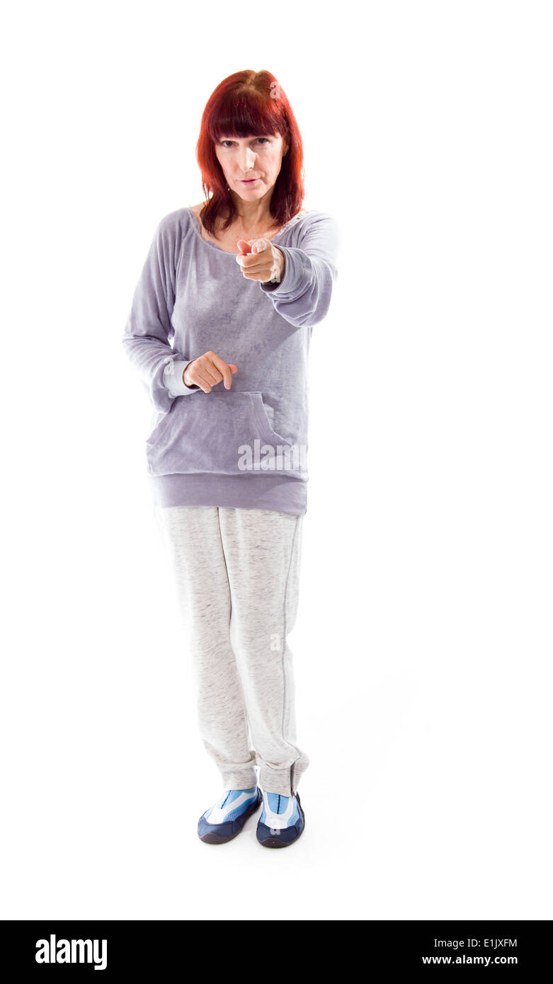 Donna matura rivolta verso la telecamera Foto Stock