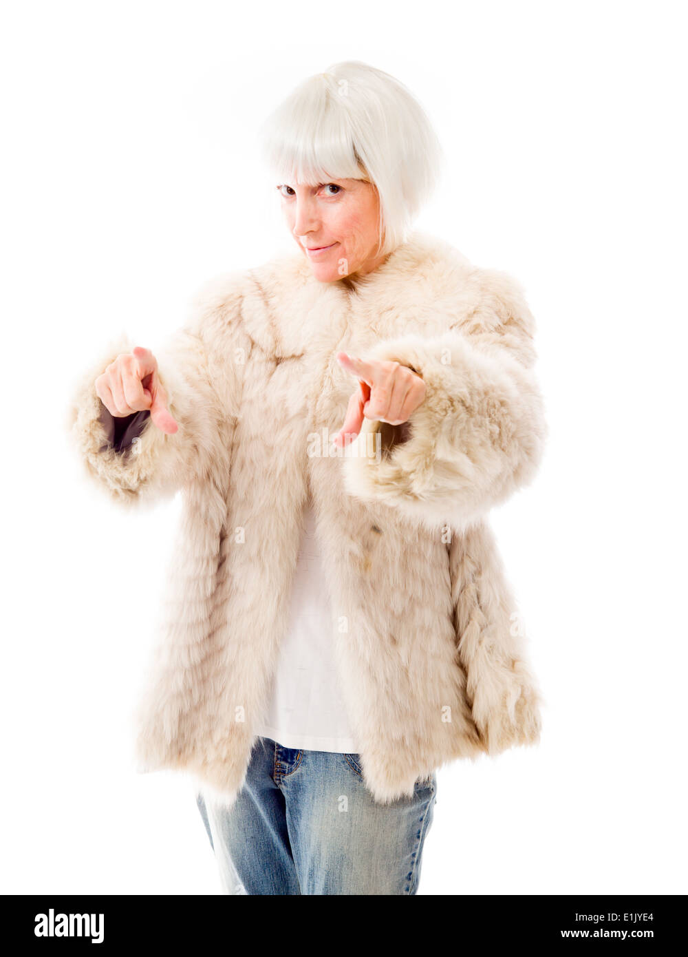 Senior donna rivolta verso la telecamera da entrambe le mani Foto Stock