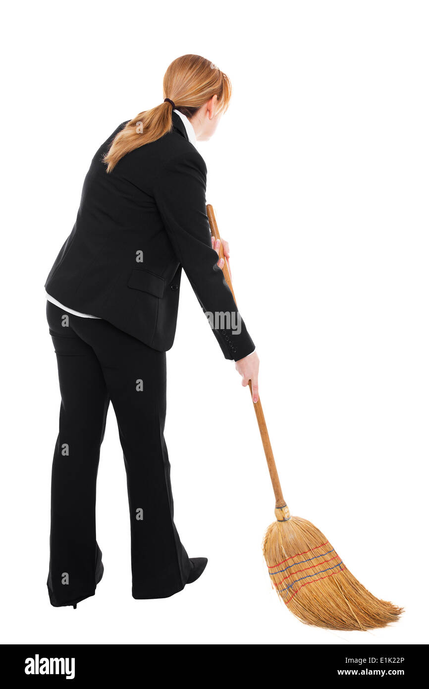Business donna con una scopa è la pulizia del suolo Foto Stock