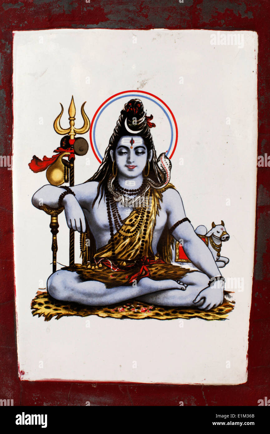 Shiva immagine su una piastrella ceramica su una balneazione ghat a Rishikesh Foto Stock
