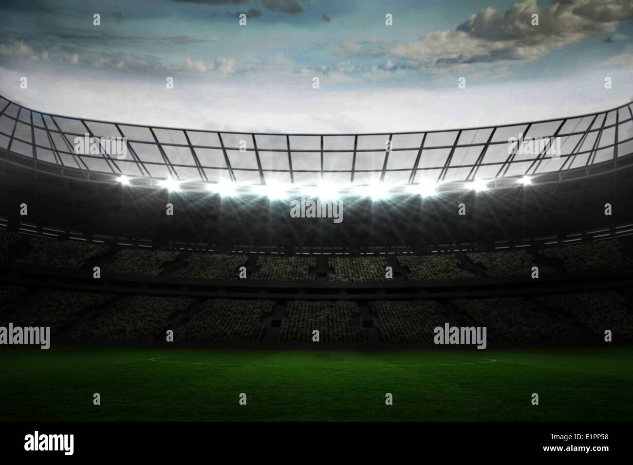 Grande stadio di calcio sotto il cielo blu Foto Stock