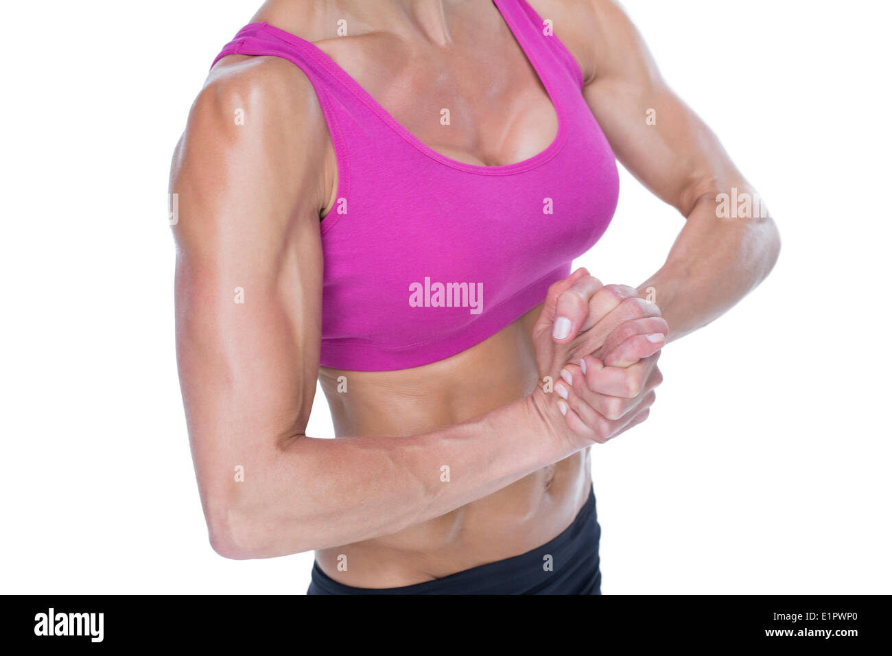 Bodybuilder femminile flessione metà sezione Foto Stock