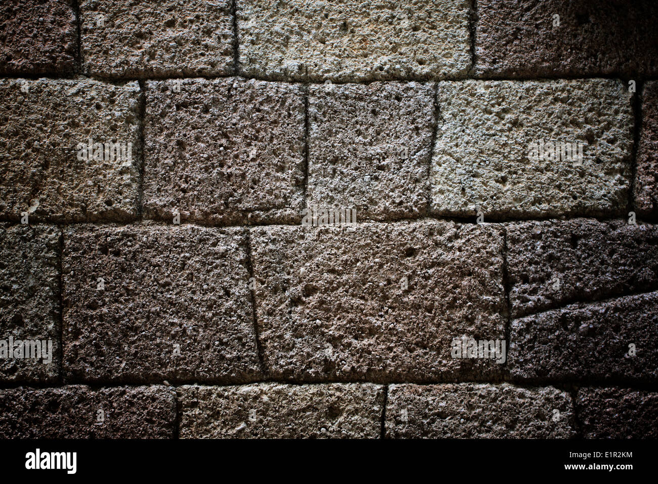 La texture del vecchio muro di pietra per lo sfondo. Foto Stock