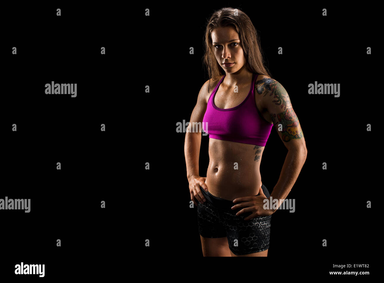 Muscolari sane atleta donna indossa di usura atletica Foto Stock