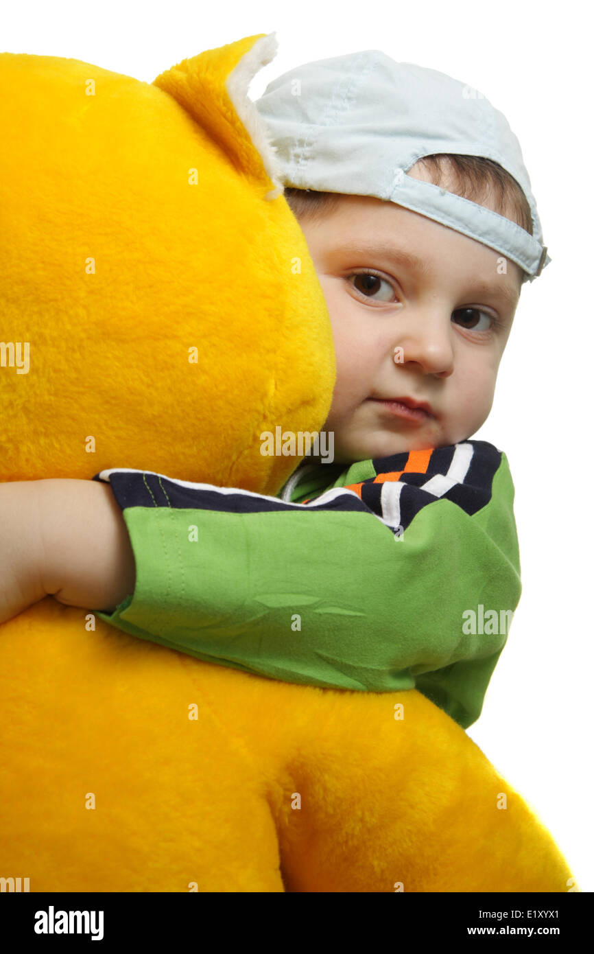 Ragazzo con grande teddy Foto Stock