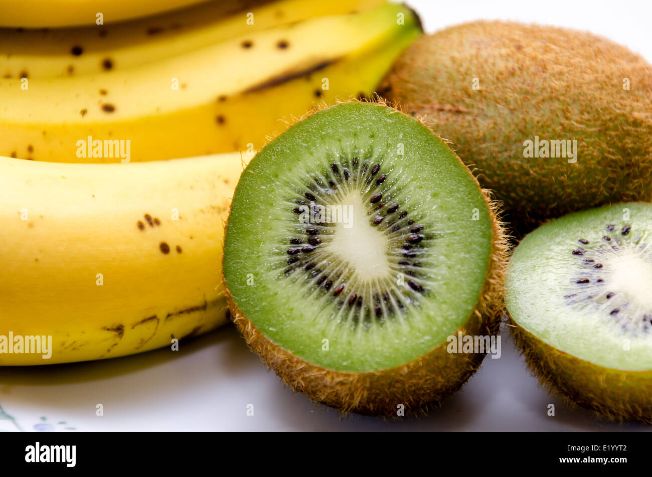 Cut-up kiwi e banane Foto Stock