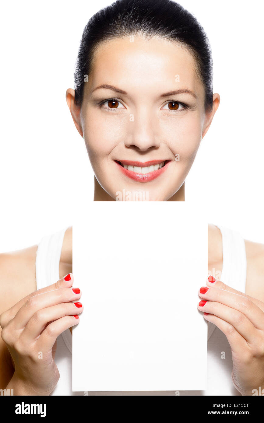 Bella giovane donna in possesso di una scheda vuota Foto Stock