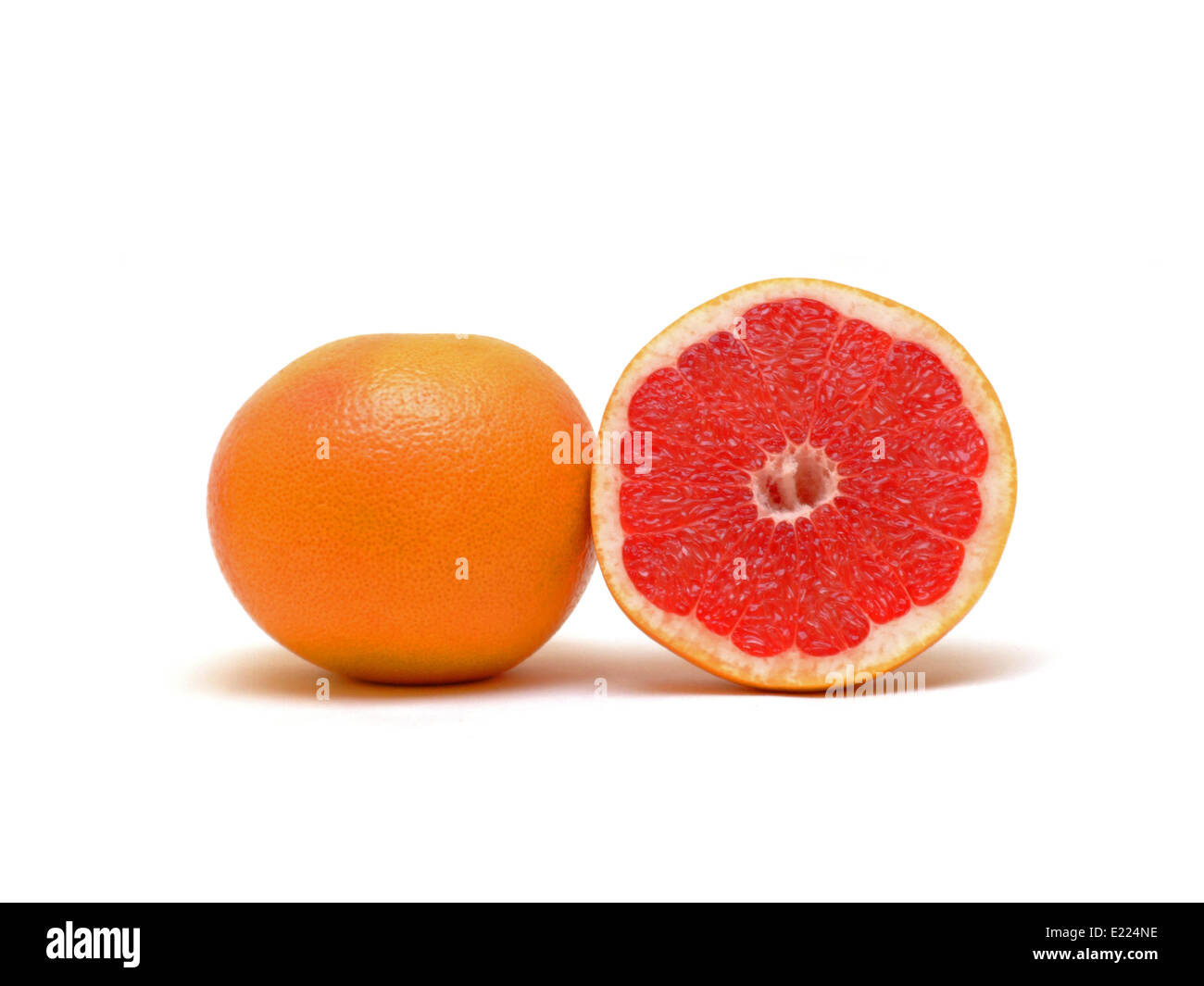 Uno e mezzo di pompelmi e di pomeli Foto Stock