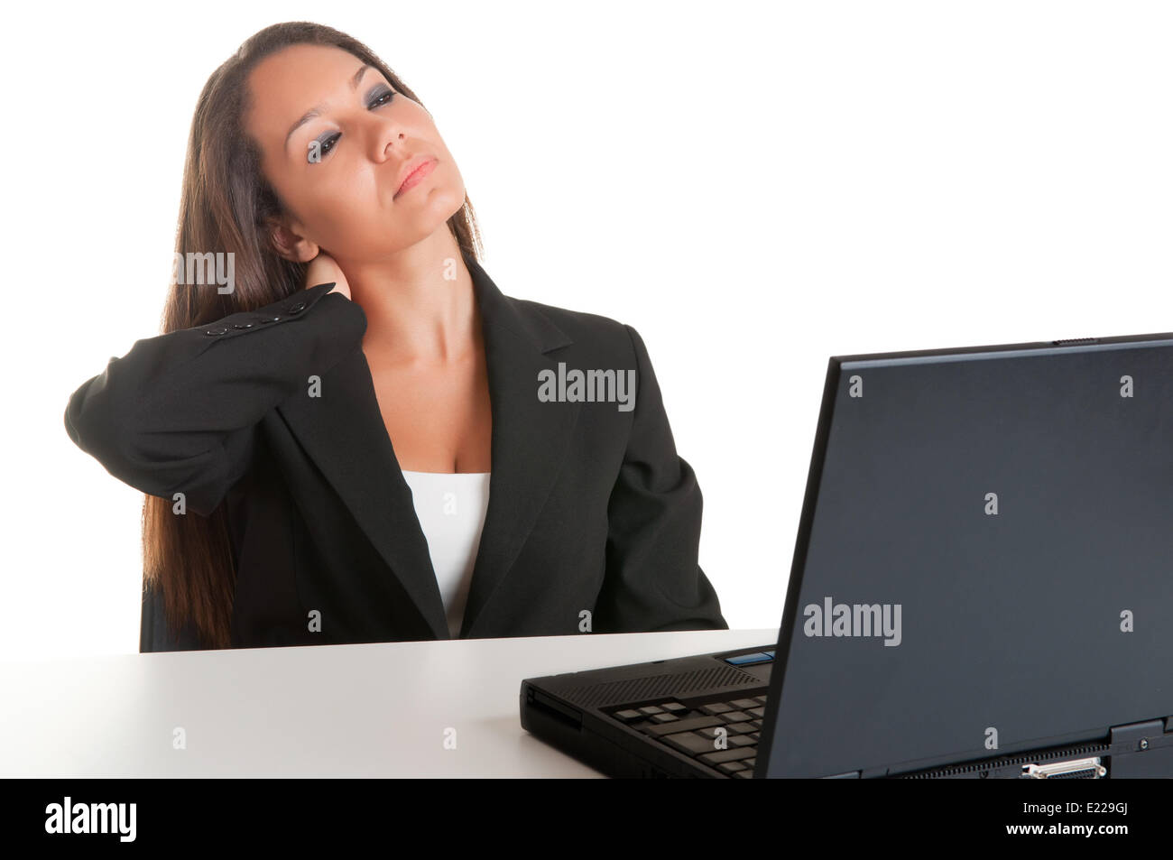 Imprenditrice seduto alla sua scrivania stanco Foto Stock