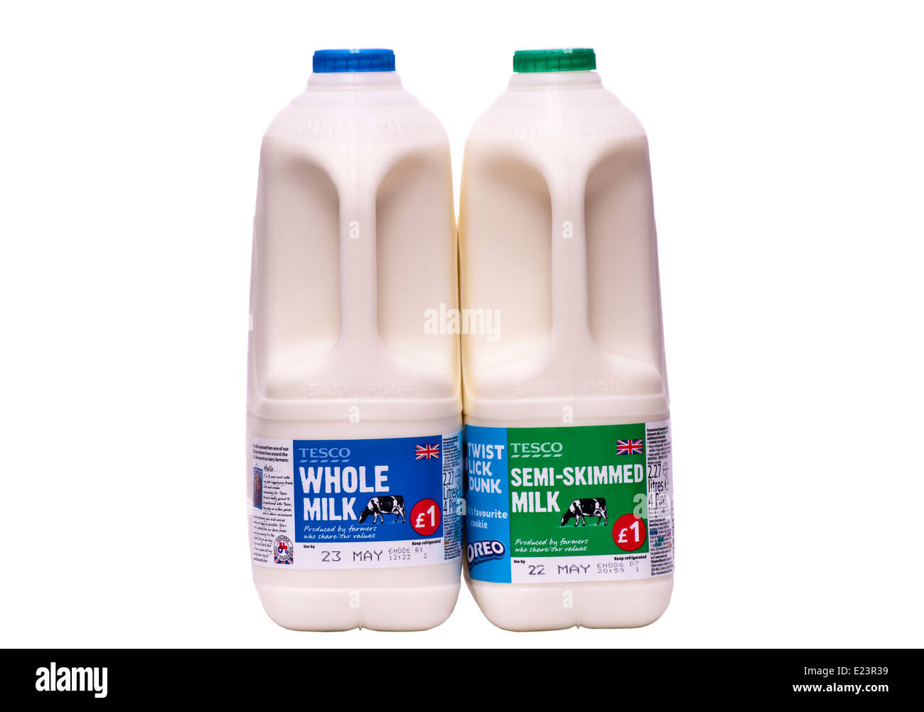 Bottiglie di pieno di grasso e il latte parzialmente scremato Foto Stock
