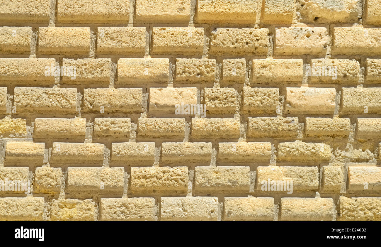 Mura di un castello con blocchi di bugnato in pietra Foto Stock