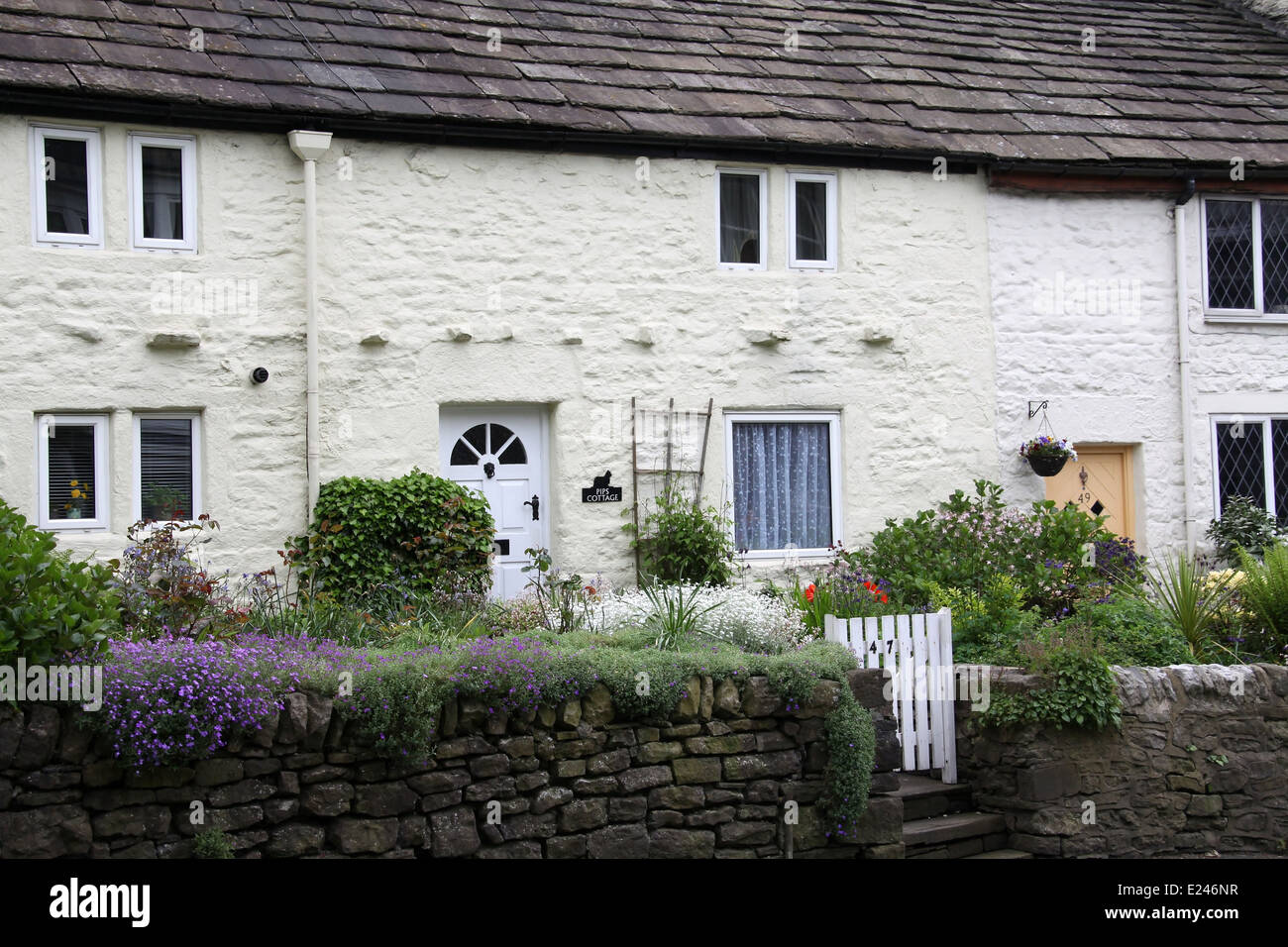 Vecchio cottage in The Derbyshire elevati picchi di città di Buxton Foto Stock