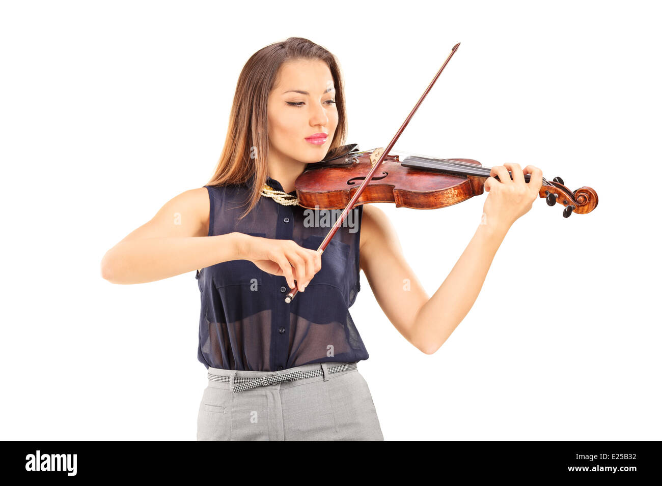 Giovane donna riproduzione di un violino Foto Stock
