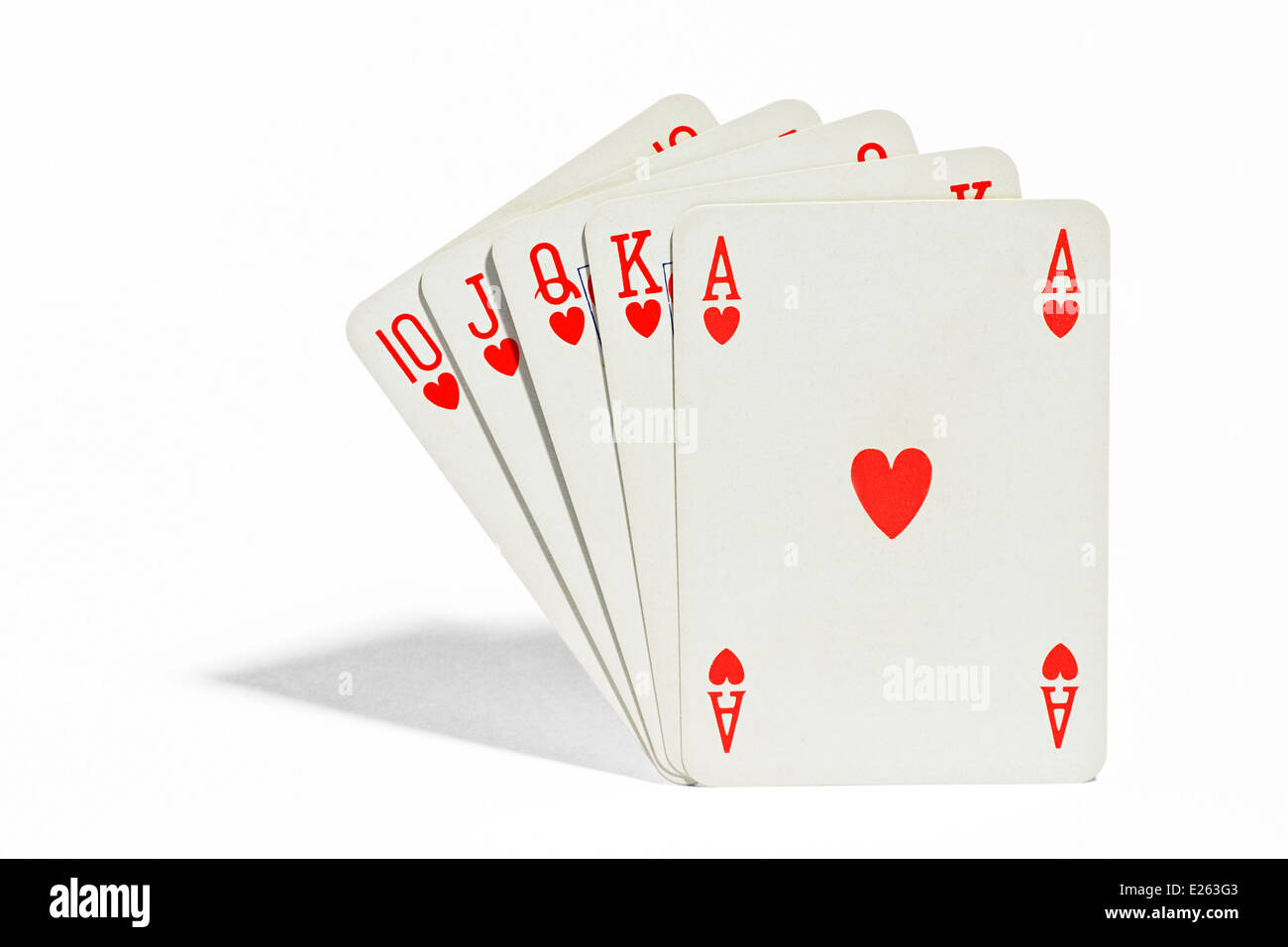 Mano vincente di carte da gioco del poker che mostra un royal flush o straight flush in tuta di cuori ace tramite dieci Foto Stock