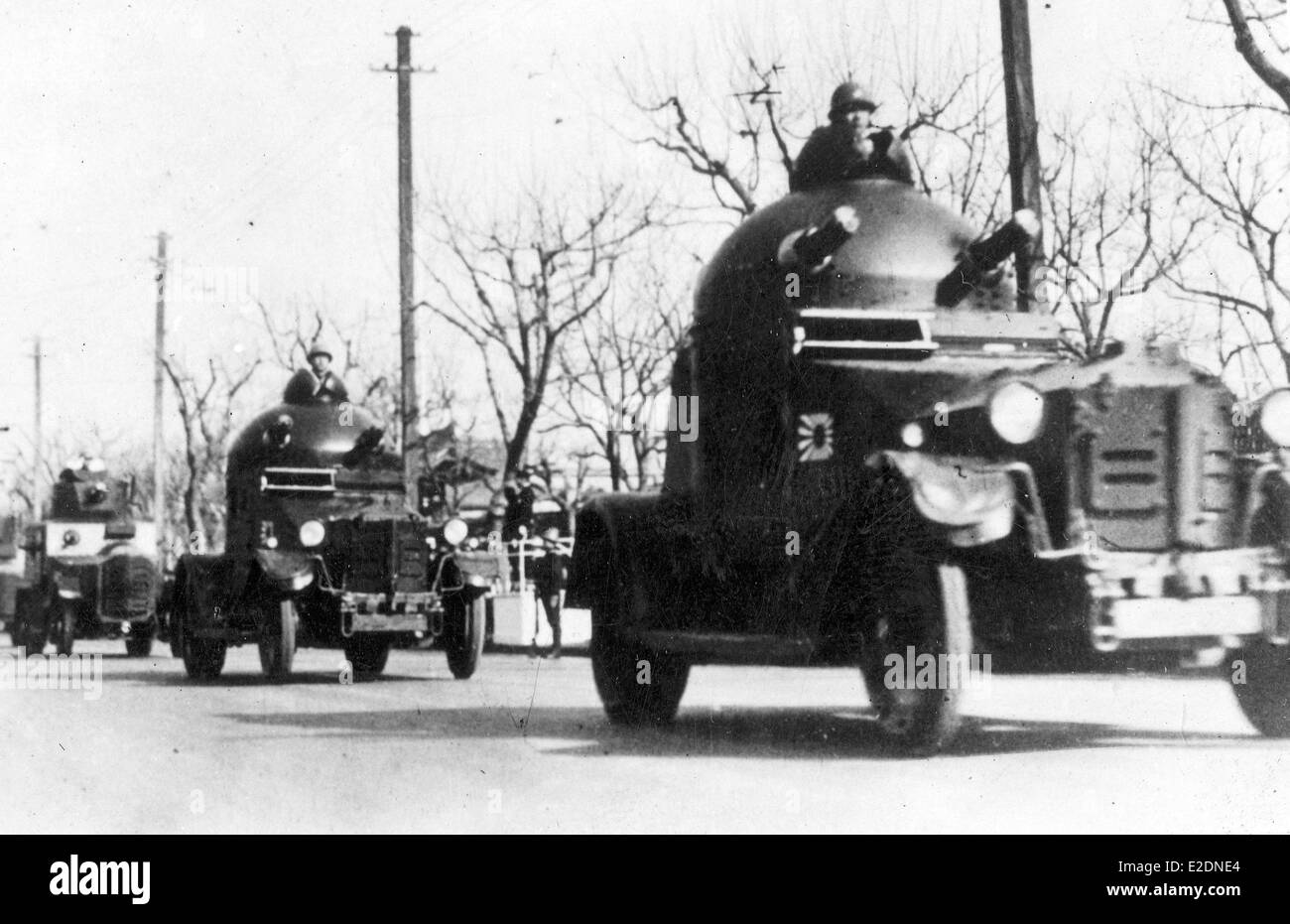 I soldati giapponesi pared in auto blindata durante il WW11 Foto Stock