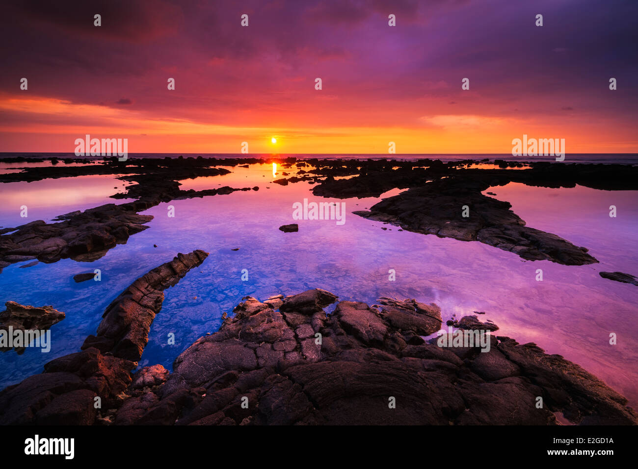 Il tramonto del royal laghetti a Hapaiali io Heiau, Costa di Kona, la Big Island delle Hawaii, STATI UNITI D'AMERICA Foto Stock