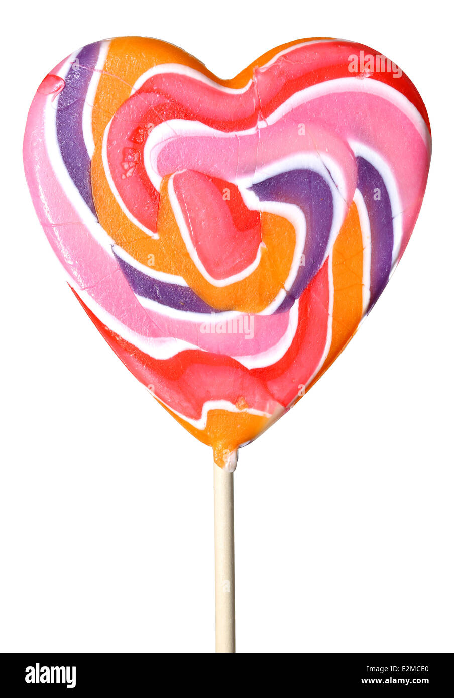 Luminose colorate a forma di cuore lollipop su sfondo bianco Foto Stock